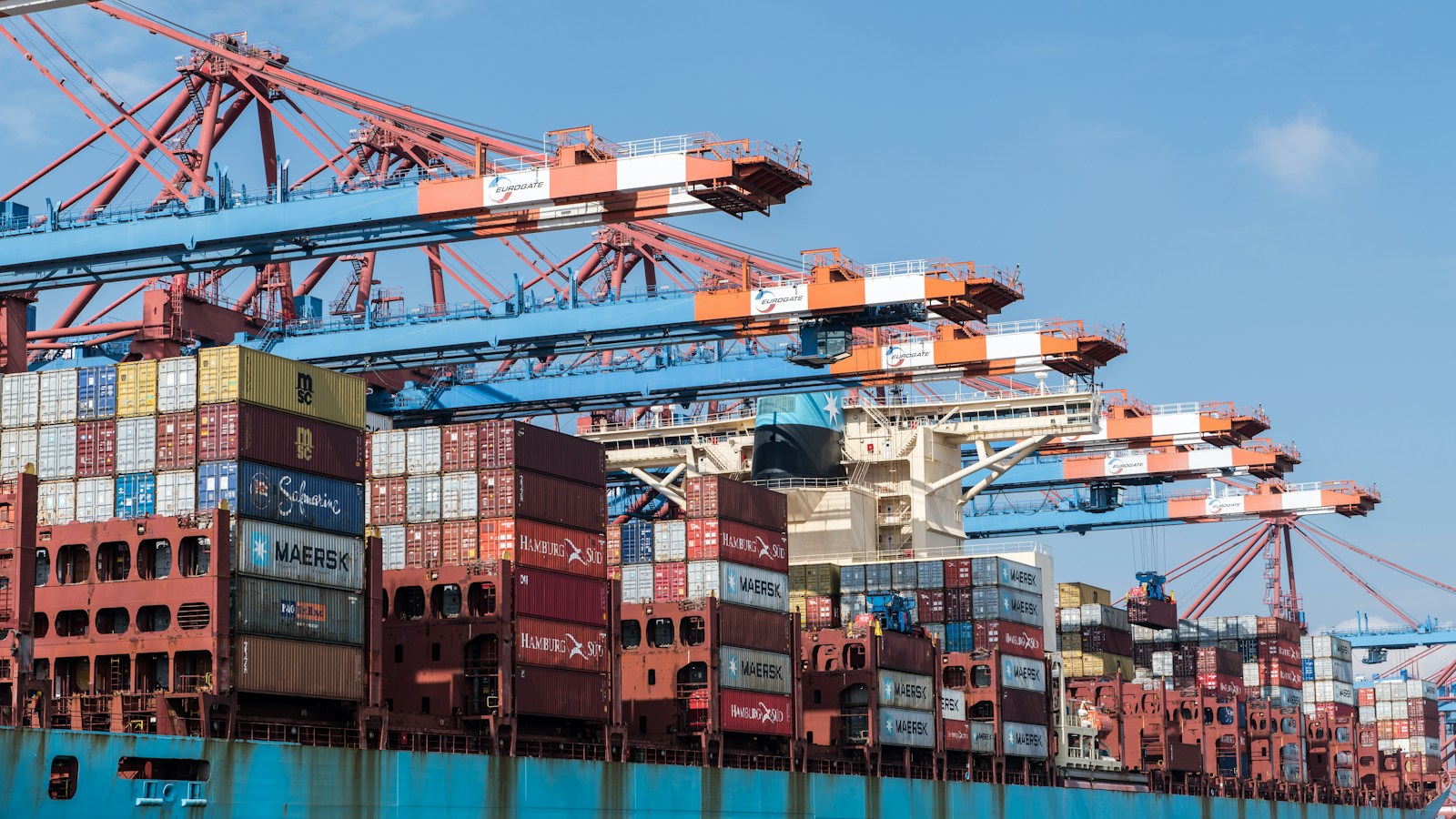 Container vessel and cranes at port
