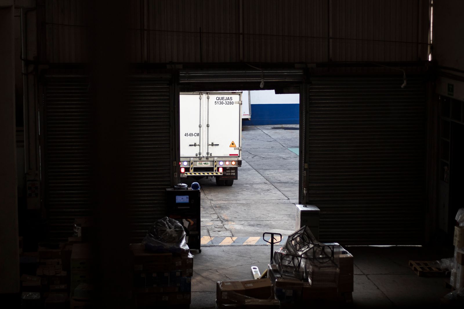 Vehicle leaving a warehouse dock